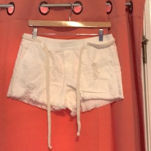 Small white jean shorts.